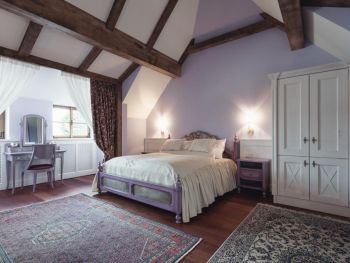 Violet bedroom in the hibiscus suite